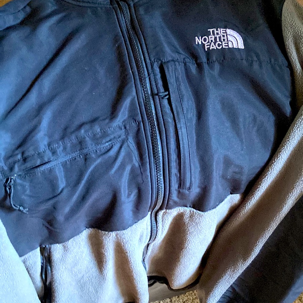 Black and grey north face long sleeve sweater